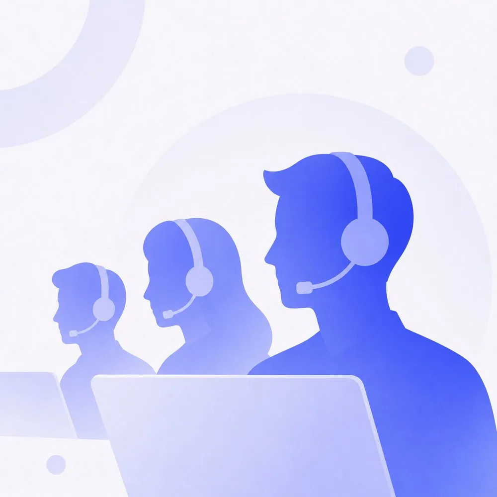 Support team wearing headsets at their laptops