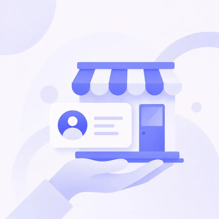 Storefront and business ID card held in an open hand